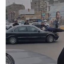 رجل مرور ينجو من موت محقق في بغداد (فيديو)